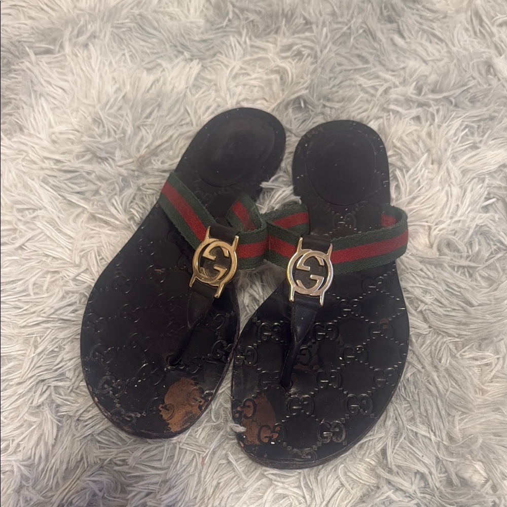 Gucci Black Sandals with Gold Emblem